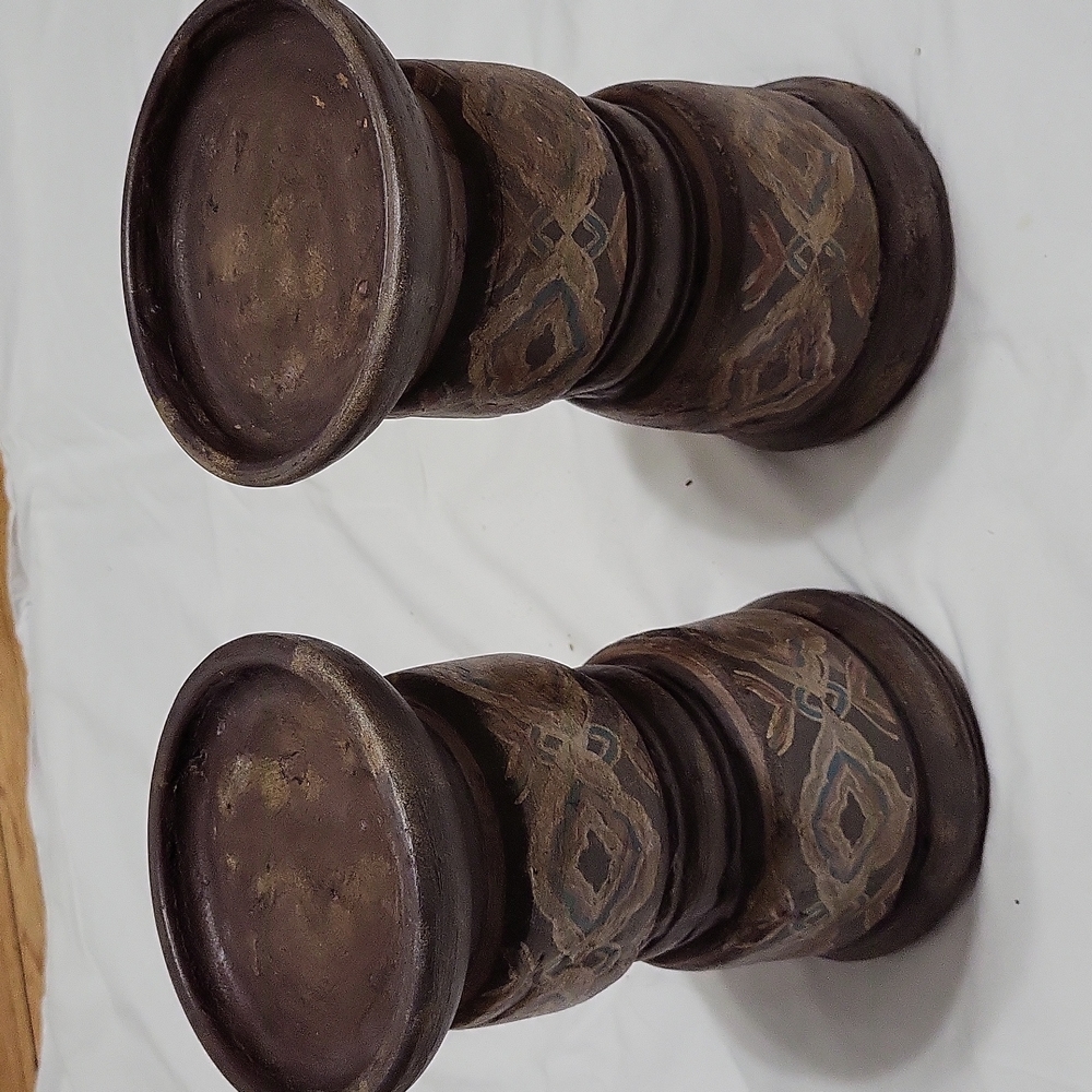 Heavy ceramic candle pillars.
